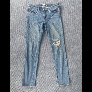 Levi’s 711 Skinny high rise distressed light wash skinny jeans